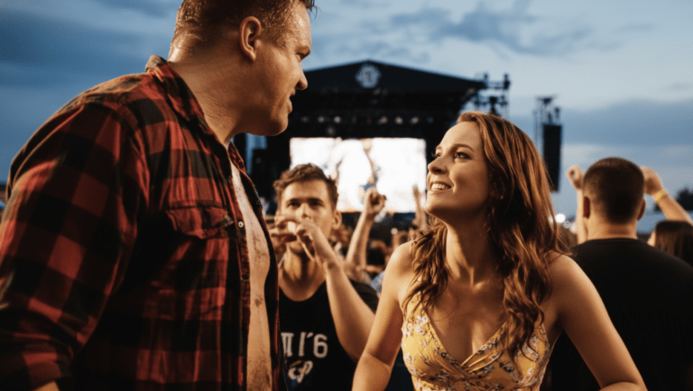 Man Shoves Woman at Concert… Her Husband Was On Stage